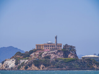 Fototapeta na wymiar Sunny view of the Alcatraz Island and San Francisco Bay