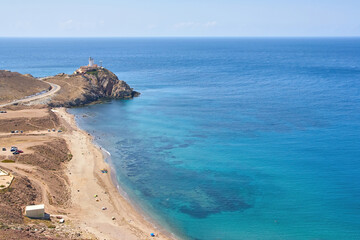 Cabo de Gata lighthouse seen on the coast of the Cabo de Gata-Nijar Natural Park.