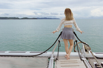 woman on the yacht out of island