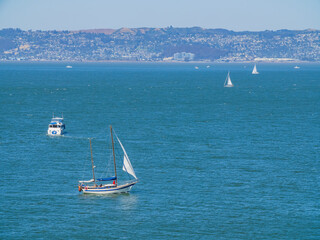 Sunny view of a ship driving in the San Francisco Bay