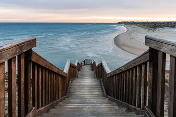 Sunrise ove the iconic boardwalk at southport port noarlunga south australia on may 18th 2021