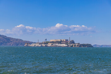 Fototapeta premium Sunny view of the Alcatraz Island and San Francisco Bay