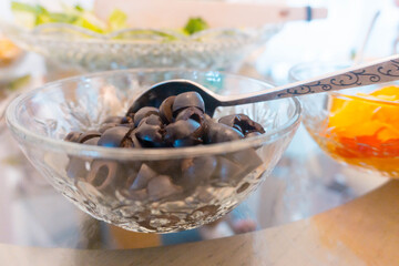 Salad Bar With Lettuce, Olives, Cheese, and Peppers