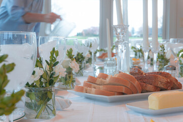 Man Serving Water for a Holiday Meal