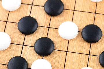 Chinese Go pawn on the chessboard