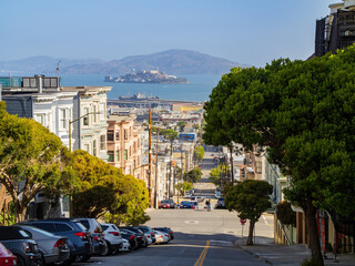 Sunny view of the Alcatraz Island and San Francisco Bay with some residence building