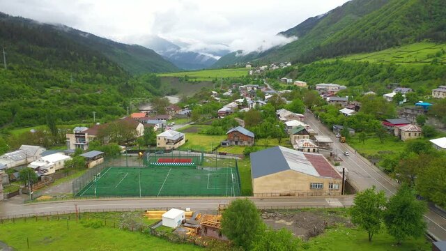 Mestia town in Zemo (Upper) Svaneti Georgia, Caucasus Mountains, 4K aerial view