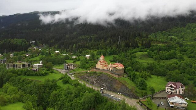 Aerial: St. Nicholas Church in Mestia, Upper Svaneti Georgia, Caucasus Mountains