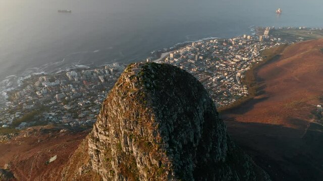 Rugged Cliff Of Lion's Head And A Hiking Trail Towards The Signal Hill In Cape Town, South Africa. aerial