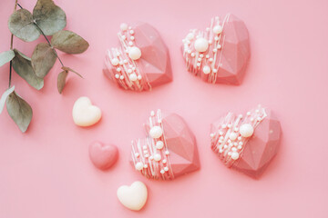 Pink heart-shaped cake. Gift for Valentine's Day and Women's Day