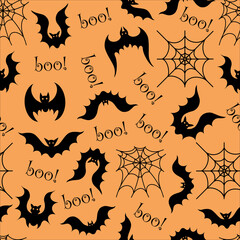 Seamless vector pattern with Halloween elements. Black silhouette of a bat and spider web on an orange background. The night vampire flies around the spider trap. A backdrop for a festive decoration.