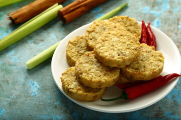 Homemade uncooked beef cutlets - food preparing in the kitchen background. 