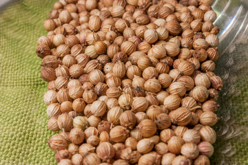 Coriander dried seeds on a table