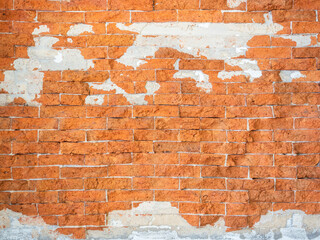 Crack brick wall texture background. Old grunge construction wall building, red brick block structure with cement.