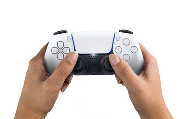 Female hand holding a Next Generation white game controller isolated on white background. © Diego