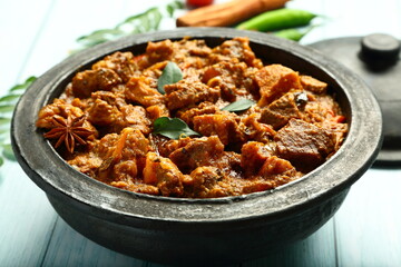 Indian mutton ,lamb curry roast- cooked in earthenware, clay pottery.