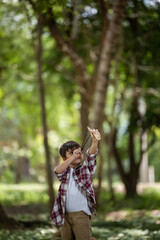 Fototapeta premium little boy fun in the nature