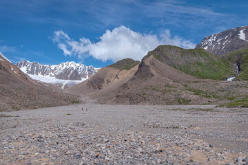 glacier mountains valley hiking hiker stones summer