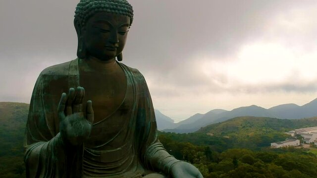 Tian Tan Buddha - The Worlds' Tallest Bronze Buddha In Lantau Island, Hong Kong - drone ascending
