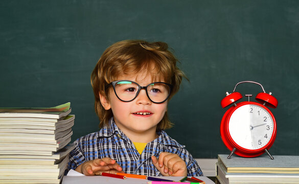 Great Study Achievement. Back To School. Education First. Cheerful Child Pupil At The Blackboard. Kids From Primary School. Talented Child. Hard Exam.