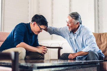 Portrait of happy love asian family senior mature father and young adult son play and looking...