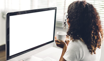 African american black woman using computer with white mockup blank screens in modern work loft