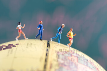 Running miniature figures on the globe