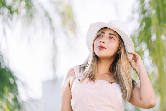 Mexican woman wearing hat, summer vacations