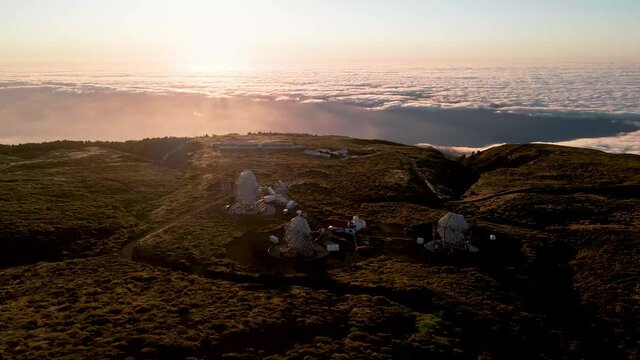 Aerial orbit over the MAGIC (Major Atmospheric Gamma Imaging Cherenkov Telescopes) located at the&nbsp;Roque de Los Muchachos Observatory&nbsp;on&nbsp;La Palma, Canary Island, Spain on sunrise.