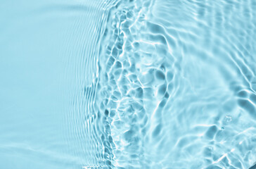 Summer banner background. Blue liquid colored clear water surface texture with splashes bubbles....