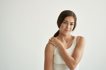 woman holding shoulder health problems massage pain