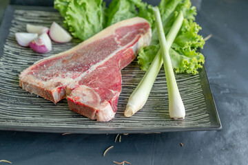 raw lamb chops with rosemary