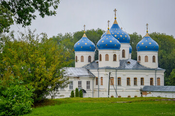 Fototapeta na wymiar Blue domes on the church in Yuriev Monastery