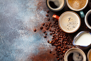 Many cups of coffee on stone table