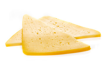 Pieces of semi-hard or hard yellow cheese with holes isolated on a white background.