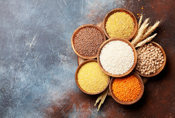 Fototapeta na wymiar Gluten free cereals. Rice, buckwheat, corn groats, quinoa and millet