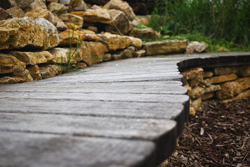 Wooden bench on a pile of stones
