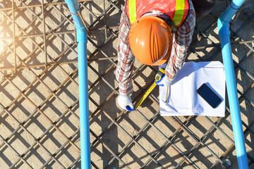Technician with measurement level during work