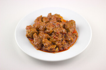 plato tipico de cariillera en salsa, typical spanish dish of pork in sauce