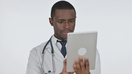 African Doctor Using Tablet for Internet, White Background