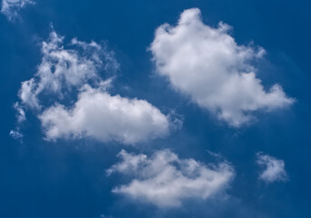Naklejka na ściany i meble dramatic clouds float across the sky