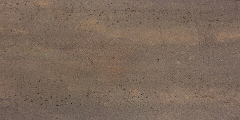 view from above on texture of old asphalt road with cracks