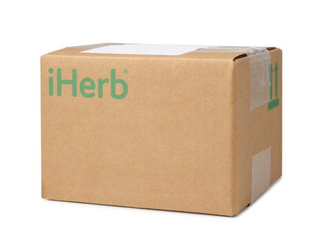 Box with the brand logo iHerb. Closeup isolated on a white background.