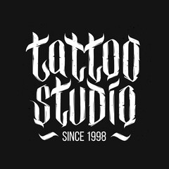 Tattoo studio creative vector logo design on black background. Tattoo sign template