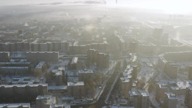 Panorama of the small Russian town and Leninsky district in the central part of the city of Kirov on a winter day from above. Russia from the drone.