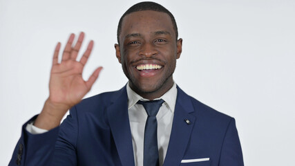 Welcoming African Businessman Waving, White Background