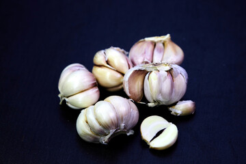garlic isolated on a wooden background
