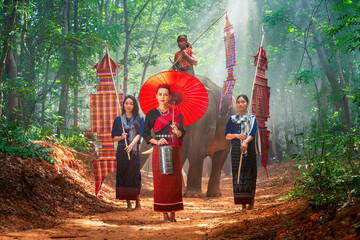 Young woman and Elephant mahout portrait. The Kuy (Kui) People of Thailand. Elephant Ritual Making or Wild Elephant Catching.