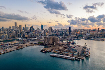 BEIRUT, LEBANON - Mar 28, 2021: Beirut port after the 2020 explosion at sunset in Lebanon - obrazy, fototapety, plakaty