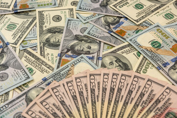 Pile of us dollar bills